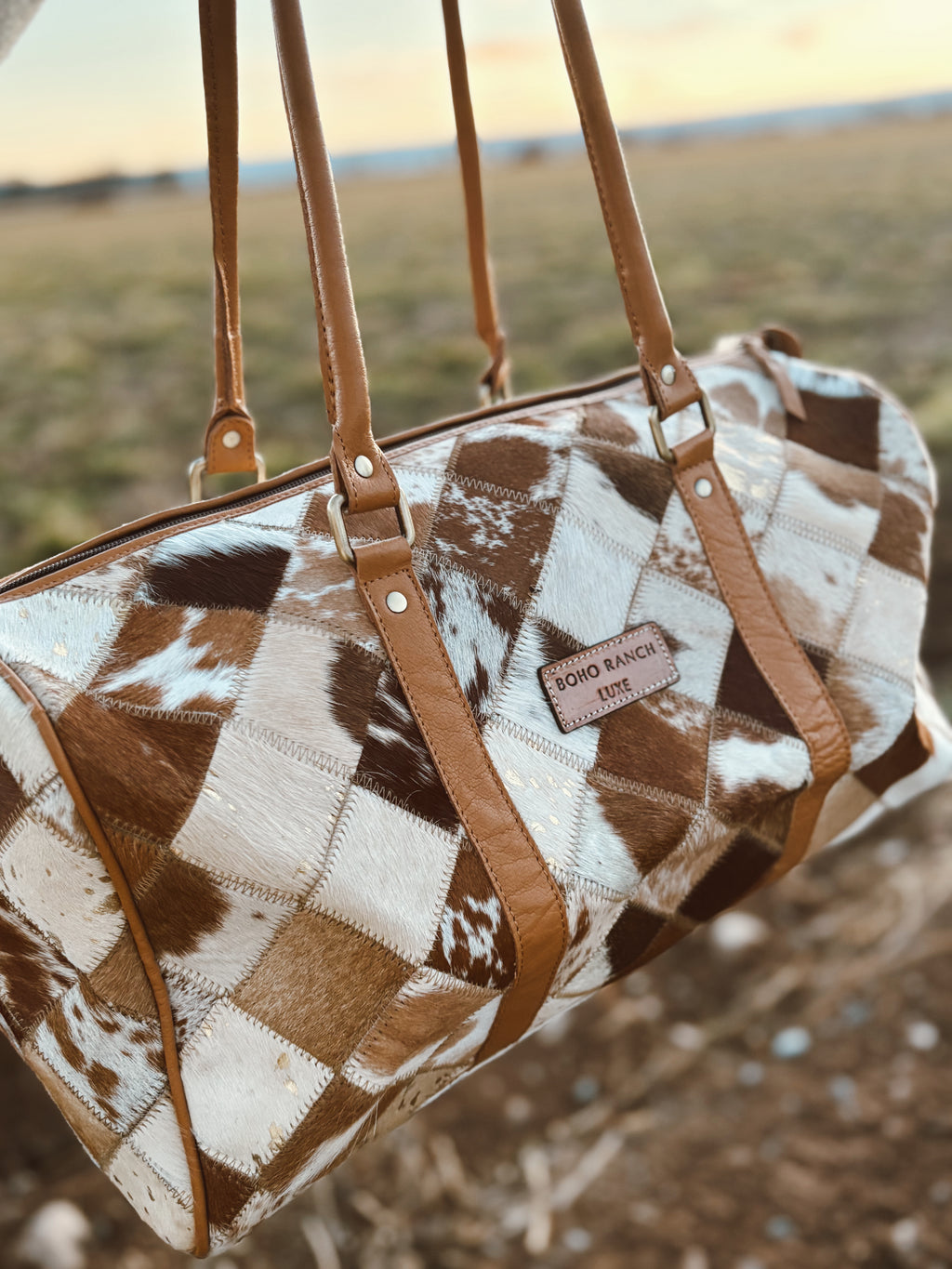 Boho Luxe Duffle Weekender — Leather Cowhide Travel Bag (Color Tan + White Cowhide)